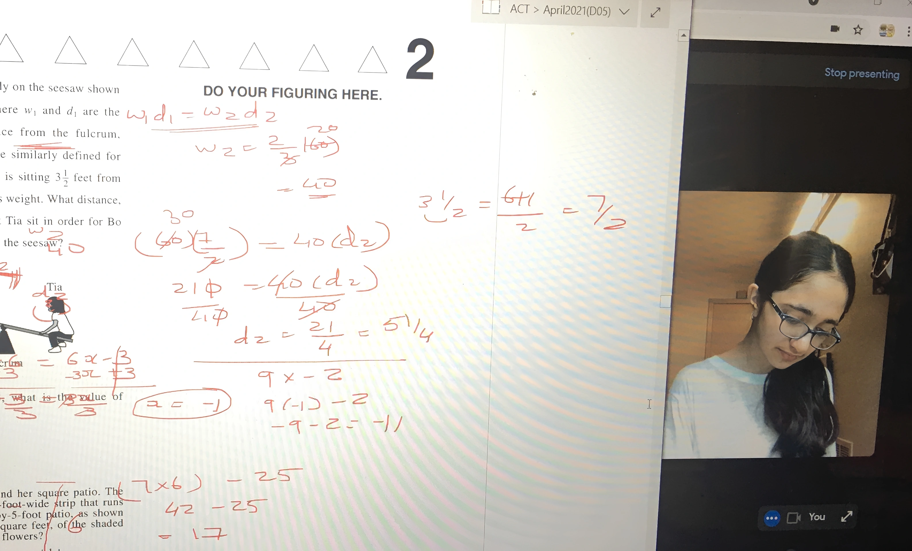 Math problems and person on video call.